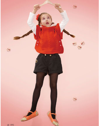 叮当猫橙色背心款毛衣女童新款上市